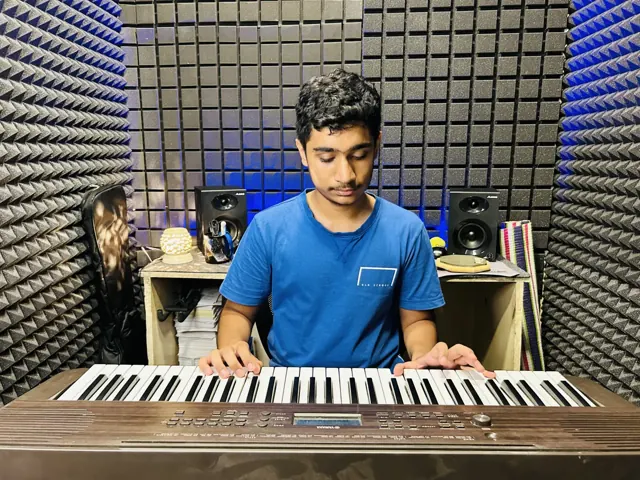 A learner practising keyboard in the DSM studio